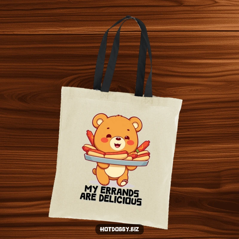 Funny tote bag showcasing a smiling bear cub carrying an impressively large tray overflowing with various colorful hot dogs.